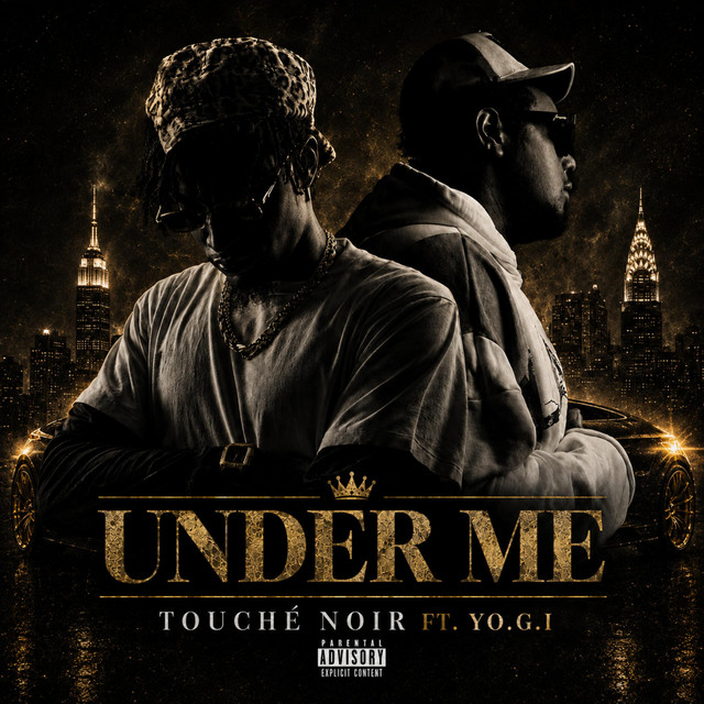 Under Me single cover — Touché Noir and YO.G.I back to back against a gold-lit New York skyline